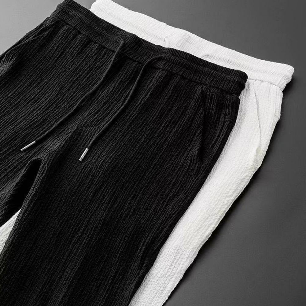 https://cdn.shopify.com/s/files/1/0508/7703/8745/products/2-pcs-set-summer-mens-suit-elastic-waist_description-13.jpg?v=1741804519